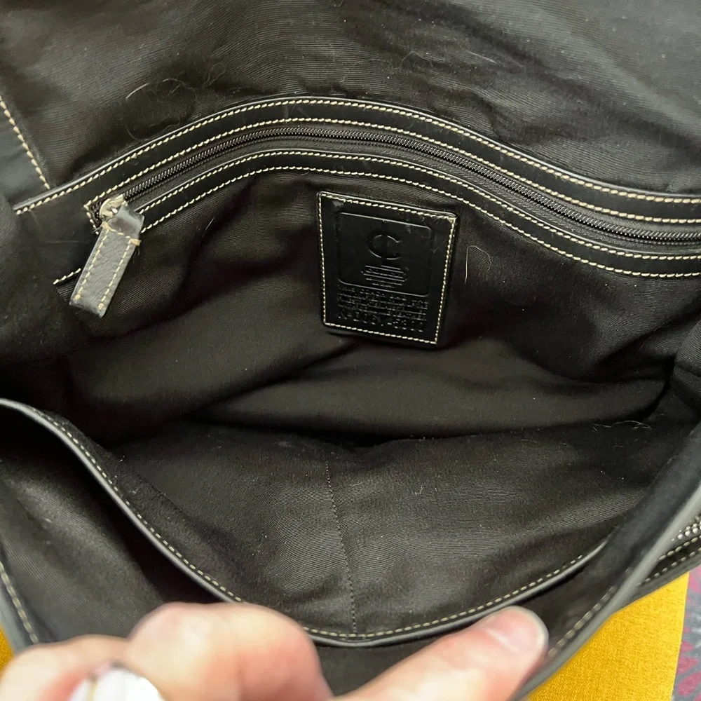 Vintage Coach black nylon leather trimmed flap messenger bag adjustable strap.